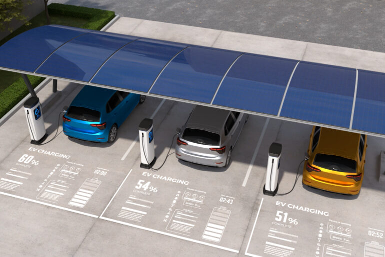 Electric cars are being charged in vehicle parking with solar panel energy